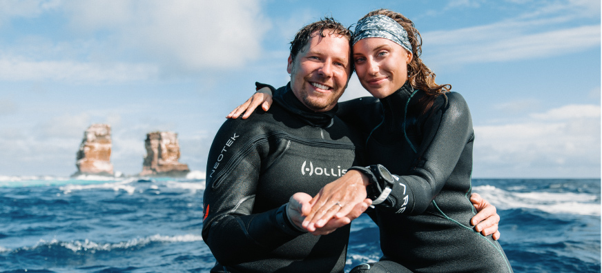 An intrepid and romantic marriage proposal in the Galapagos deep, happy couple footer image